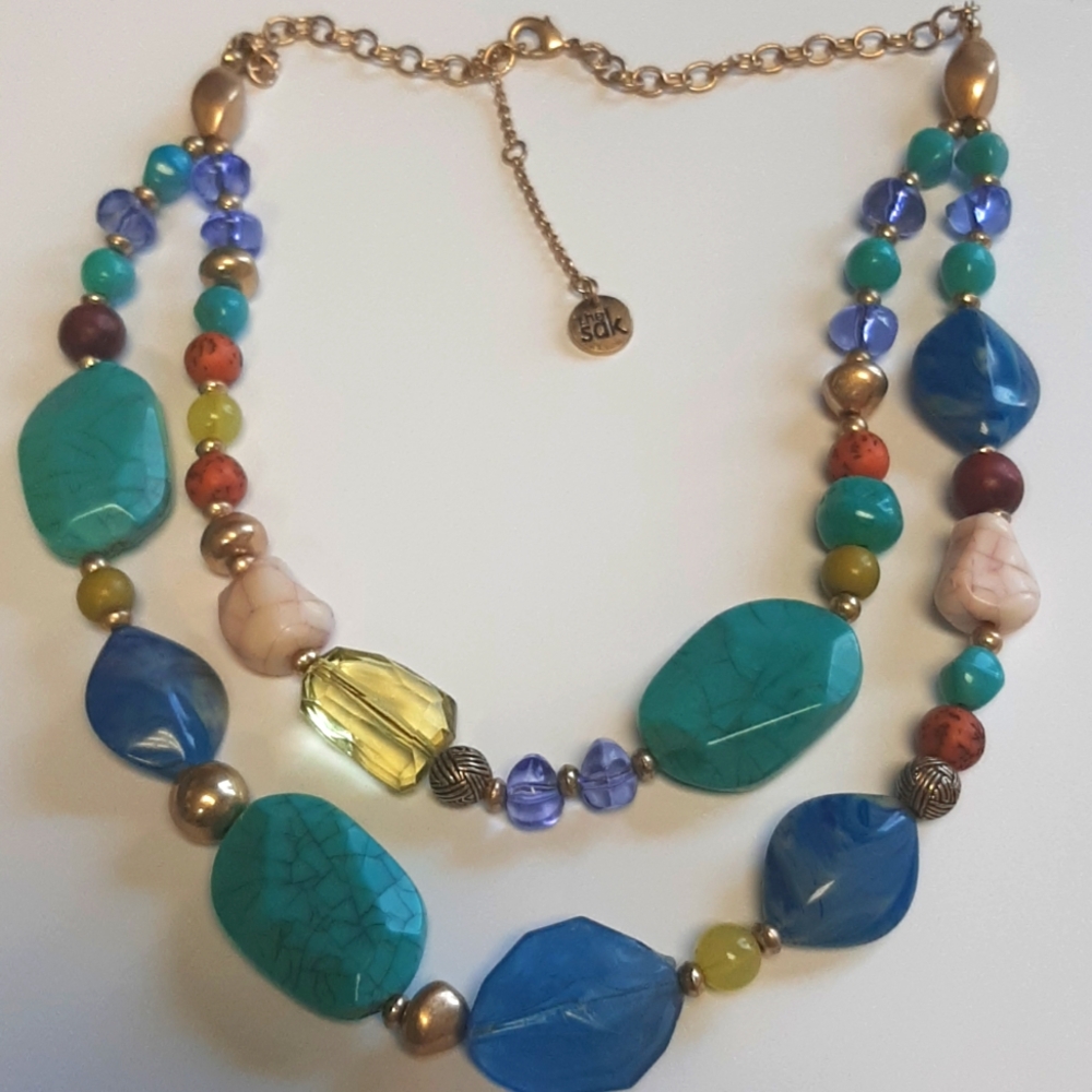 299. THE SAK NECKLACE BLUE AND BROWN COLORS GOLD TONE 10" PLUS 3" EXTENSION
